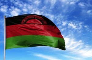 Bandera nacional de Malawi en un asta de bandera