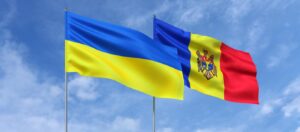 flags-ukraine-moldova-flagpoles-center-flags-sky-background-place-text-ukrainian-moldavian-3d-illustration_630687-1941